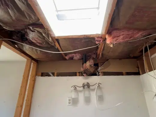 Bathroom remodel plumbing work with walls and fixtures exposed for Plumbing Service Areas in Index.Html