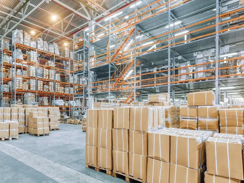 Large commercial interior with warehouse-style plumbing service access for Contact Bellflower Plumbing Pros