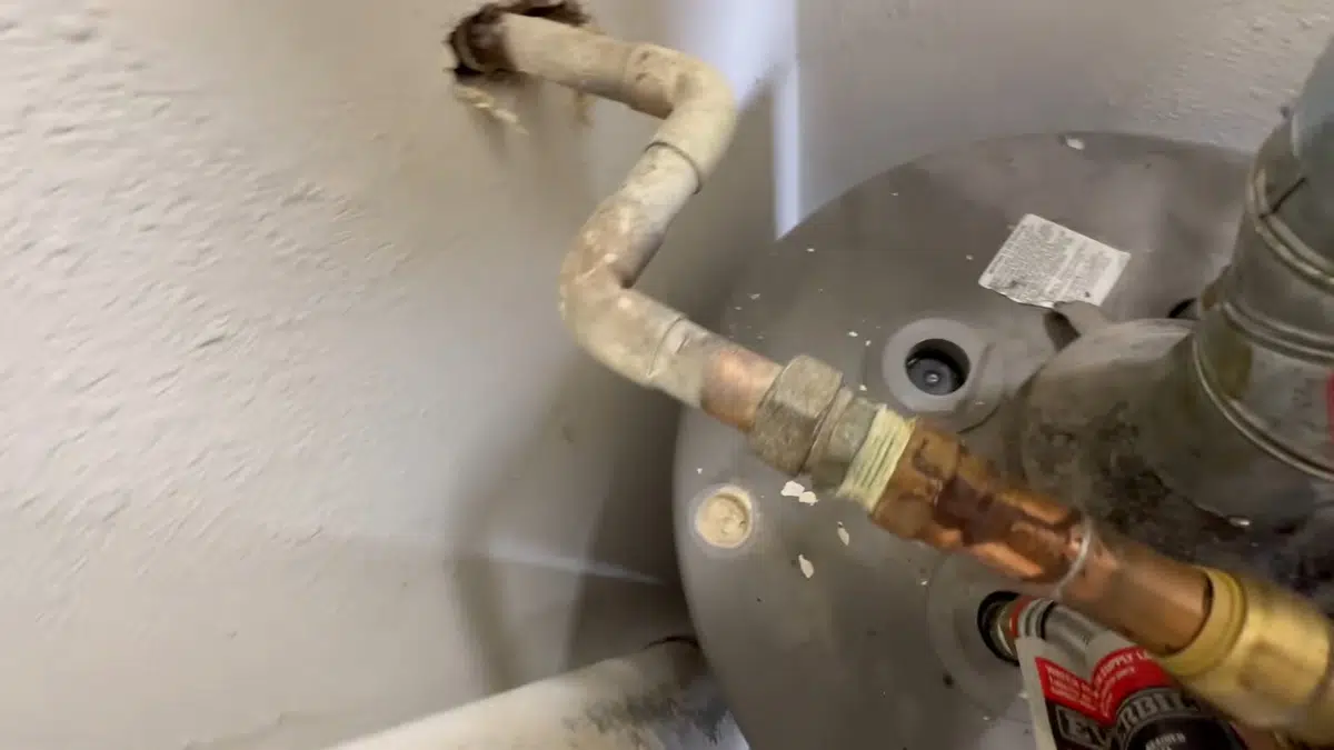 Water heater component showing corrosion, anode wear, or inlet repair for Water Heater Repair in Bellflower, CA